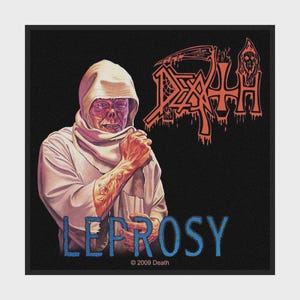 May include: A rectangular fabric patch featuring a hooded figure with a textured, weathered face wearing a light-coloured robe. The graphic includes the red text DEATH in a stylised font, the blue text LEPROSY, and the small text 2009 Death at the bottom.