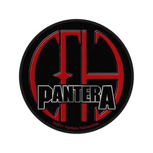 May include: A round black patch featuring the word "PANTERA" in white block letters with a red outline. A red stylized graphic is above the word. The text "©2011 Pantera Partnership" is at the bottom.