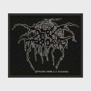 May include: A square black fabric patch featuring a white embroidered design of the band logo Darkthrone. The logo has a jagged, dripping, and stylized aesthetic. Below the logo, the text reads 1999 DARK THRONE U.L.T. RAZAMATAZ in white.