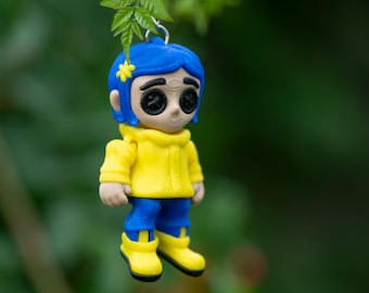 Mini Button Eyed Girl Flexi Keychain – Articulated Collectible in Raincoat