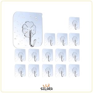 May include: A collection of clear, adhesive wall hooks. The hooks are made of transparent plastic and feature a flower-shaped design. The image shows a variety of hook sizes, suitable for organizing items in a home or office.