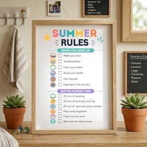May include: A framed print with the words "SUMMER RULES" in colorful letters. The checklist includes tasks like making the bed, eating breakfast, and before-screen-time activities. A small chalkboard with a grocery list is also visible.