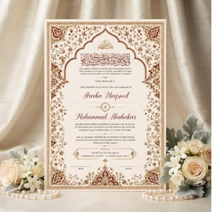 May include: A rectangular marriage certificate featuring an ornate, intricate border in shades of deep red, gold, and cream. The document includes Arabic calligraphy at the top, followed by English text detailing the union of Areeba Maqsood and Muhammad Abubakar, dated June 2024, with designated signature lines for the bride and groom at the bottom.