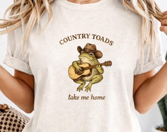 Land-Kröten nehmen mich Haus T-Shirt, lustiges Frosch-Cowboy-Gitarren-T-Stück, Vintages westliches Amphibien-Grafik-Shirt, wunderliches Land-Frosch-T-Shirt