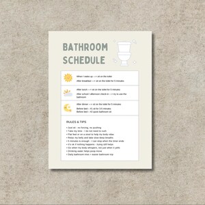 May include: A cream-colored bathroom schedule chart with the title "Bathroom Schedule" in green. The chart includes a list of times and tips for bathroom use, with small illustrations of a sun, cloud, and moon.