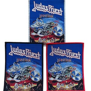 May include: Three rectangular patches with the band name "Judas Priest" and the album title "Painkiller" in white text on a blue background. The patches feature a graphic of a winged creature riding a motorcycle.