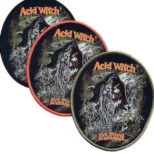 Puede incluir: Tres parches redondos con el texto "Acid Witch" en naranja y un gráfico de monstruo. Los parches tienen bordes negros, naranjas y verdes. El texto "EVIL SOUND SCREAMERS" también es visible en los parches.