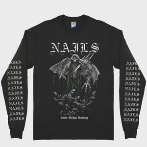 May include: Black long-sleeve shirt featuring the band name "NAILS" in gothic font. The shirt displays a detailed illustration of a skeletal figure with wings and a sword, with the text "Every Bridge Burning" below the graphic. The sleeves repeat the band's name.