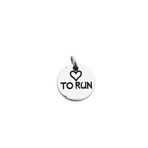 May include: Silver charm with a heart and the words "I love to run" engraved on it.