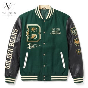 May include: A dark green varsity jacket with black sleeves, featuring a large letter B with a bear graphic, the text "EST. 1968 VARSITY CHAMPIONS", "GOLDEN BEARS" on the sleeve, and "Cal" on a pennant. It has cream-colored striped ribbed trim.