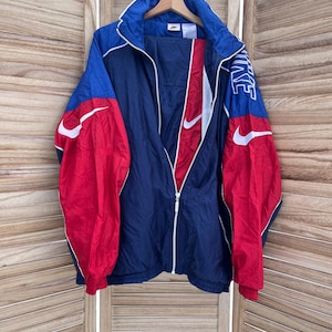red and navy nike windbreaker