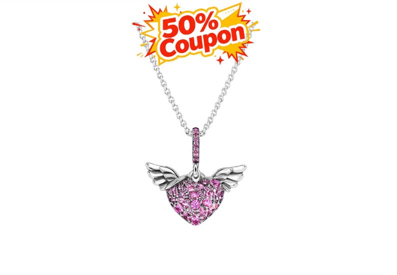 May include: A silver necklace with a pendant shaped like a heart with wings. The heart is covered in pink gemstones. The necklace has a chain and a clasp. A coupon graphic is in the top left corner.