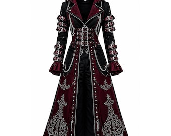 May include: A long, hooded coat in black and deep burgundy featuring silver-toned metal chains, multiple buckled straps on the sleeves, and a central front closure. The lower panels are decorated with intricate silver embroidery and metal studs.