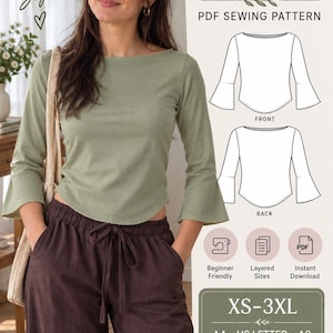 May include: A sage green boat neck tee with three-quarter length bell sleeves and a curved hem. The image includes text: Sew Your Style, BOAT NECK TEE, PDF SEWING PATTERN, FRONT, BACK, Beginner Friendly, Layered Sizes, Instant Download, XS-3XL, A4, US LETTER, A0, PRINT CUT STITCH, SEW MORE HAPPY.