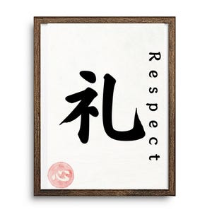 May include: A framed print featuring a large black calligraphy character and the English word "Respect" in a vertical orientation. A small, round, pink seal with a heart symbol is at the bottom. The frame is a dark brown color.