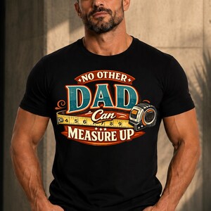 May include: Black t-shirt featuring the text "NO OTHER DAD Can MEASURE UP" in a colourful design. The design includes a tape measure and a measuring tape tool. A great gift for Father's Day.