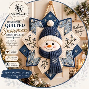 May include: A quilted snowman door hanger featuring a star-shaped base in shades of blue and cream with snowflake and floral patterns. The snowman wears a dark blue knit-style hat with a white pom-pom and a matching blue scarf with fringe.