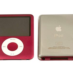 May include: A magenta digital music player with a black screen and a white circular click wheel featuring menu, play, pause, and track skip icons. Beside it, the metallic silver back of the device displays the Apple logo, iPod text, and 30GB.