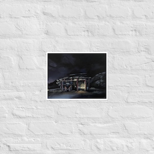 May include: An art print showing a nighttime scene of a wooden structure with a warm light inside. The artwork uses dark blues and greens, focusing on the illuminated interior and the surrounding landscape.
