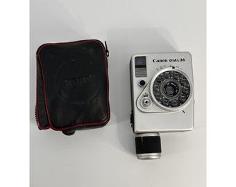 Canon Dial 35 Half Frame Camera With Leather Bag. Read