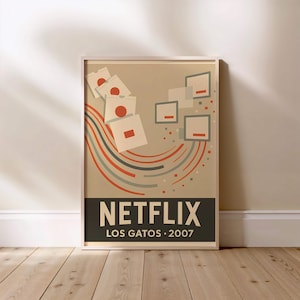 May include: Framed poster with a beige background featuring a retro design. The poster has the word "NETFLIX" in large white letters, with "LOS GATOS • 2007" below. The design includes squares and lines in red, gray, and orange.