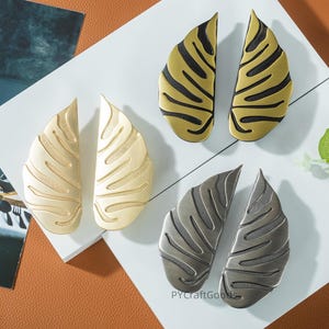 Tiradores de cajón con diseño de hojas, tiradores dorados para armarios de cocina, herrajes únicos para pomos de puerta.