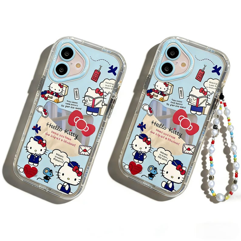 May include: Two clear phone cases with a light blue background featuring Hello Kitty illustrations, red bows, and travel-themed icons. The cases have a clear border and a beaded wrist strap. The text "Hello Kitty" is visible.