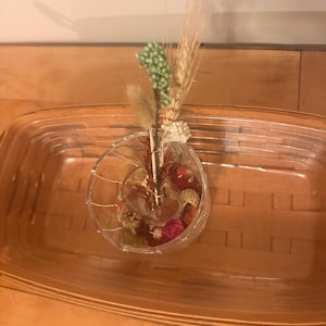 Dried flower reed diffuser in vintage illuminating tea light gel holder