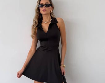 Abito da tennis da donna, abito sportivo con cerniera sul collo e pantaloncini incorporati, mini abito sportivo, nero