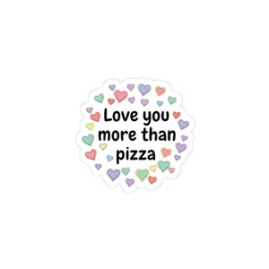 May include: A white sticker with the phrase "Love you more than pizza" in black text. The text is surrounded by a border of colorful hearts in shades of pink, purple, blue, yellow, and green.