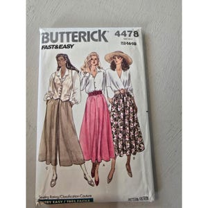 May include: A Butterick sewing pattern, model 4478, featuring illustrations of three women in different outfits. The pattern is labeled "Fast & Easy" and includes sizes 12-14-16. The cover displays the text "Very Easy / Tres Facile".