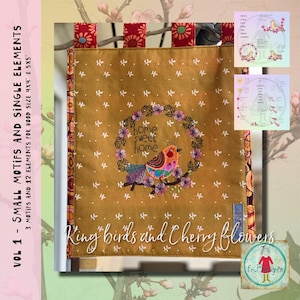 May include: A gold fabric panel with a white embroidered bird and cherry blossoms. The bird is surrounded by a wreath of cherry blossoms and the text "home sweet home". The panel is edged with red and orange fabric.