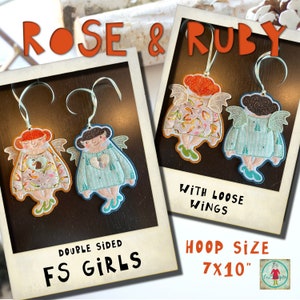 May include: Two double-sided embroidered angel ornaments with loose wings. The angels are named Rose and Ruby. The ornaments are 7 inches by 10 inches and are designed for a 7x10 inch embroidery hoop.