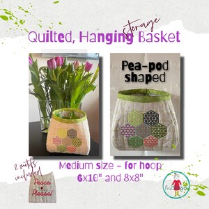 May include: A quilted hanging basket in a pea-pod shape. The basket is made of beige linen with a green trim and features a hexagonal pattern in shades of pink, green, and blue. The basket is 6x10 inches or 8x8 inches.