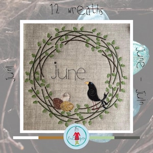 May include: Embroidered wreath design with the word "June" in the center, featuring a black bird and a nest with three eggs. The wreath is surrounded by green leaves and vines. The text "12 wreaths" is at the top.