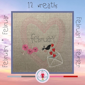 以下が含まれることがあります： ピンクの糸で刺繍されたハート型のデザインが施されたベージュの生地。ハートの中に黒い糸で「2月」と刺繍されています。赤いクチバシを持つ黒い鳥が赤いハートを刺繍して持っています。画像の上部に「12輪」という文字が書かれています。