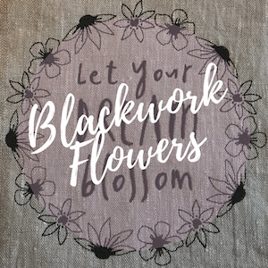 May include: Let your blackwork dream flowers bloom. A black and white floral wreath with a purple background and the text "Let your blackwork dream flowers bloom".