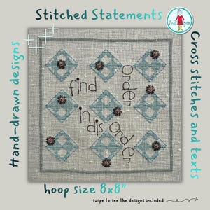 May include: A square piece of light gray linen fabric featuring a cross-stitch pattern of nine blue diamond shapes arranged in a grid. The text "find order in dis Order" is embroidered in black. Small metallic flower embellishments are attached.