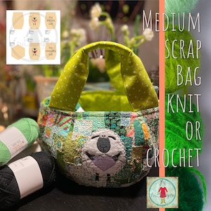 Könnte beinhalten: Eine grüne und weiße Patchwork-Stofftasche mit einem Schafdesign und dem Text "my crocheting bag". Die Tasche hat einen grünen Griff und steht auf einem Tisch mit grünem und schwarzem Garn.