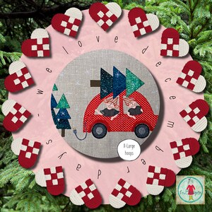 May include: A pink background with a circle in the center. The circle has a gray linen texture with a red car carrying a Christmas tree. The car is surrounded by white hearts with red and white checkered patterns. The words "We love December" are written in a circle around the car.