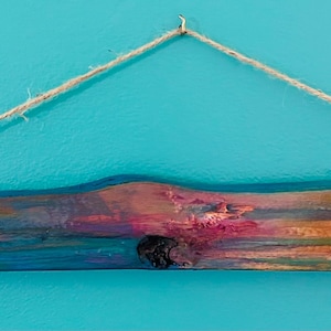 May include: A set of three ceramic mugs with a speckled, matte finish. The mugs are in shades of cream, light gray, and dark gray. Each mug has a simple, minimalist design, perfect for coffee or tea.