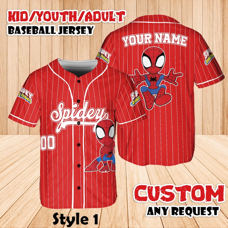 May include: Red baseball jersey with white pinstripes, featuring a cartoon Spider-Man graphic. The front says "Spidey" and "00". The back has "YOUR NAME" above a Spider-Man graphic. Text at the top says "KID/YOUTH/ADULT BASEBALL JERSEY".