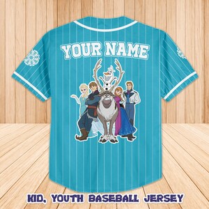 May include: A turquoise baseball jersey with white pinstripes and white trim. The back of the jersey features the text "YOUR NAME" above a graphic of characters from the movie Frozen. The text "KID, YOUTH BASEBALL JERSEY" is at the bottom.