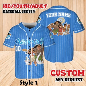 May include: A blue baseball jersey with white pinstripes, featuring characters from the movie "Moana." The front displays "Moana 2" and the number "00." The back has "YOUR NAME" above a character graphic. Text at the top reads "KID/YOUTH/ADULT BASEBALL JERSEY."