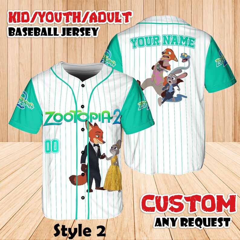 May include: White baseball jersey with teal accents and vertical stripes. Features Zootopia characters and the text "ZOOTOPIA 2". Includes the text "KID/YOUTH/ADULT BASEBALL JERSEY", "YOUR NAME", "CUSTOM ANY REQUEST", and "Style 2".