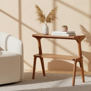Two tier end table with wood legs and walnut finish
