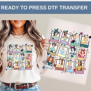 May include: A cream-colored t-shirt featuring a colorful graphic of Disney princesses in polaroid-style frames. The image includes the text "READY TO PRESS DTF TRANSFER" at the top. The design is also shown on a separate transfer sheet.