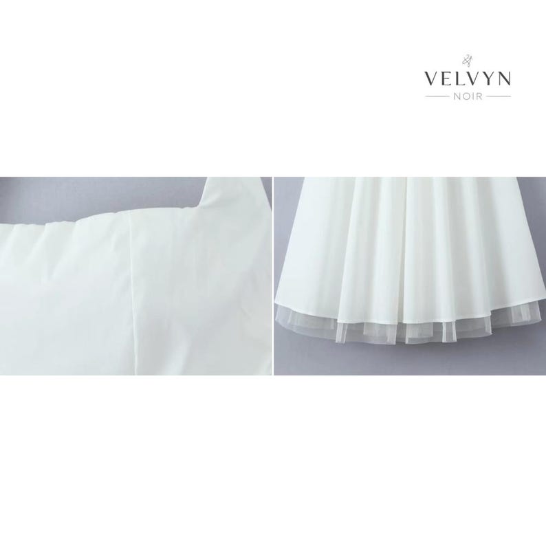May include: A white dress with a layered skirt and a sheer hem. The dress has a simple, elegant design, perfect for special occasions. The brand name "VELVYN NOIR" is displayed in the upper right corner.