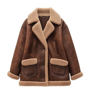 May include: A brown faux leather jacket with a tan shearling lining and trim. The jacket features a notched collar, two front pockets, and button closures. The sleeves and hem are also trimmed with shearling.