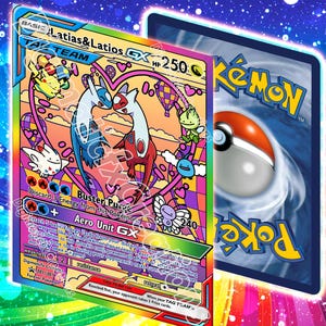 May include: A colorful Pokémon trading card featuring Latias and Latios. The card has a heart-shaped design with various characters and text, including "TAG TEAM" and "GX". The reverse side of the card displays a Poké Ball and the Pokémon logo.